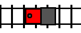 A train, facing left, traveling leftward along a track.